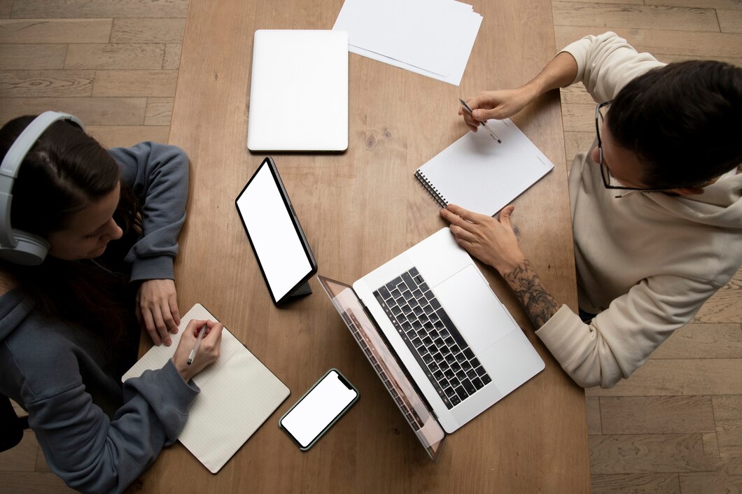 man-woman-working-together-from-home-desk_23-2149208580
